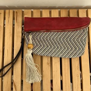 Black, white, and red clutch